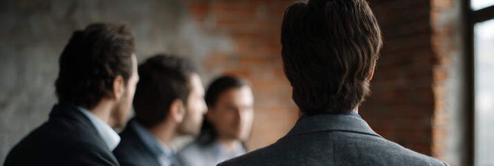 Business meeting team discussion Focused business team discussion loft office, collaborative