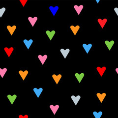 Seamless pattern of multicolored hearts on black background