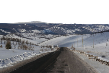 Icy mountain road through snowy forest hills