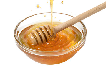 Golden honey dripping from wooden dipper into glass bowl isolated on transparent background, natural sweet food ingredient concept for cooking, bakery, breakfast and health uses