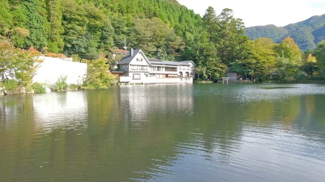 Yufuin,Oita,Kyushu,Japan - October 14, 2018 : Lake Kinrin with Mount Yufu and blue sky background at Yufuin, Oita, Kyushu, Japan
