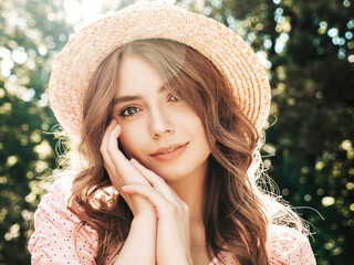 Portrait of young beautiful hipster female in trendy summer sundress. Sexy carefree woman posing on...