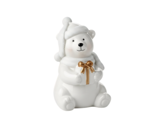 Cute white bear figurine holding gift box with golden ribbon