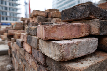 Weathered brick reclaimed urban construction masonry pile texture