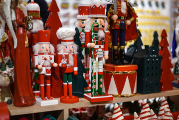 Traditional Christmas souvenir nutcrackers. Wooden toys in a gift shop.