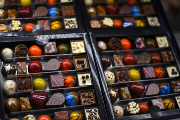 multi-colored chocolate candies in a box