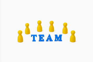 Team communication and cooperation concept with wooden team text