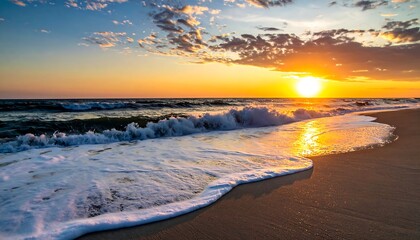 Golden sunset over a sandy beach, with waves gently rolling ashore under a sky with scattered clouds