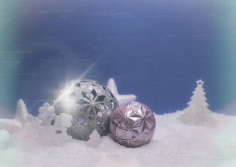 Vintage Christmas ornaments in snow with film grain and soft glow, inspired by nostalgic 1980s winter holiday vibe.