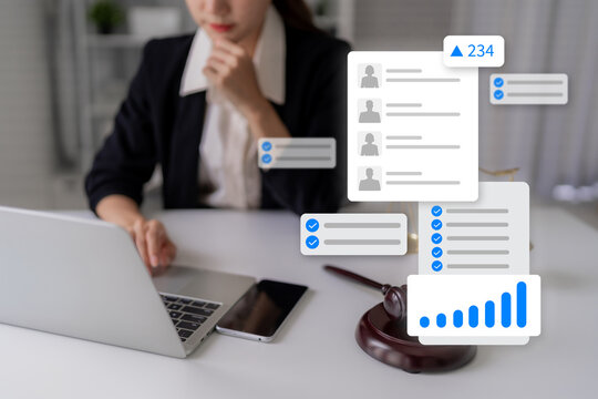 Asian adult woman professional legal expert analyzing data managing cases with digital tools workflow automation in modern office setting for justice efficiency decision making