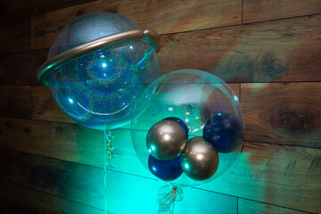 Bright multi-colored inflatable balloons for holiday decoration.