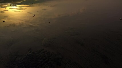 sandy soil on the seashore | seashore | sunset on the beach | golden hour