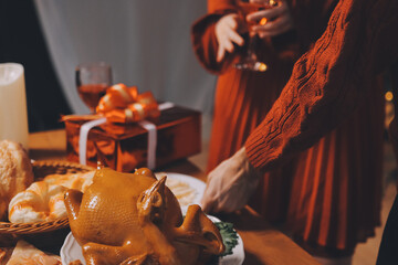 Festive Office Christmas Party with Delicious Food. A beautifully decorated office space with Christmas trees and festive lights, set up for a holiday party.