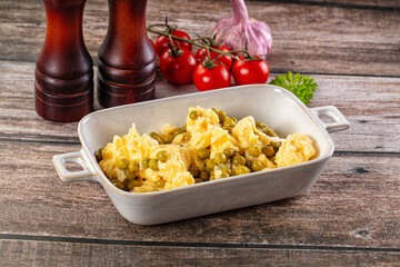 Scrambled egg omelet with green peas