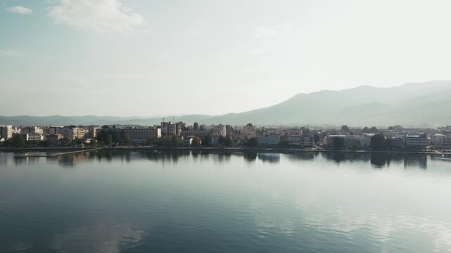 Stunning morning view of Ohrid, city on the shore of the lake, foggy morning, 4k