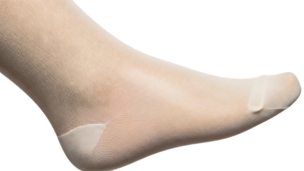 Close up of a beige sheer stocking on a foot image