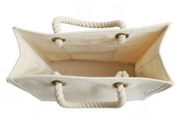 White canvas tote bag with rope handles isolated on a transparent background