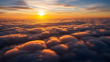 Fototapeta premium Breathtaking sunset viewed above a sea of clouds