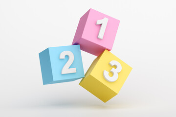 Colorful cubes showing numbers one, two and three are floating on white background