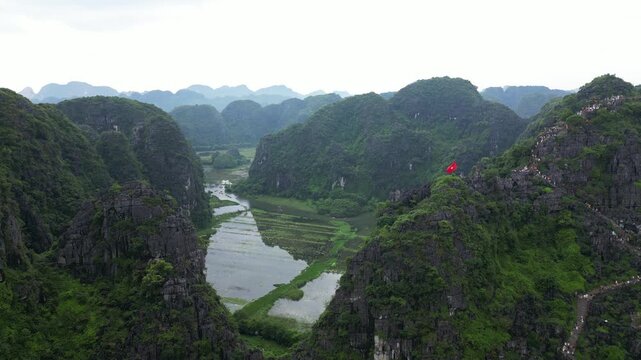 Asia, Ninh B&igrave;nh and Tam Coc in the Red River Delta region of Vietnam - limestone karst formations emerge from rice paddies and rivers "Halong Bay on Earth" - Mua Caves (Hang Mua), 