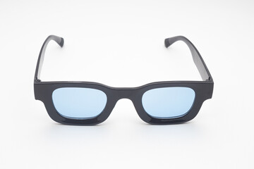 Trendy Black Rectangular Sunglasses with Blue Tinted Lenses Isolated on White Background