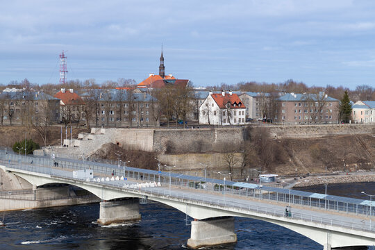 Border Friendship bridge and Narva city on March day