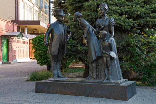 TAGANROG, RUSSIA - MAY 07, 2025: Sculptural composition based on the story of A.P. Chekhov's "Thick and Thin" on a spring day