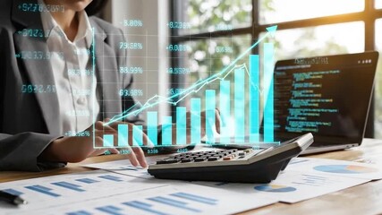 Business Analysis with Laptop and Bar Chart Overlay. Woman in Gray Blazer Analyzing Financial Data and Investment Growth Using Calculator. Documents - Powered by Adobe