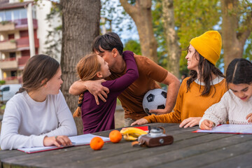 Obraz premium Happy family enjoying quality time together in park
