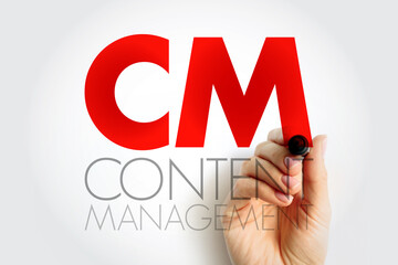 CM Content Management concept with hand writing acronym, referring to digital organization, publishing, workflow, and website maintenance system for media and online business