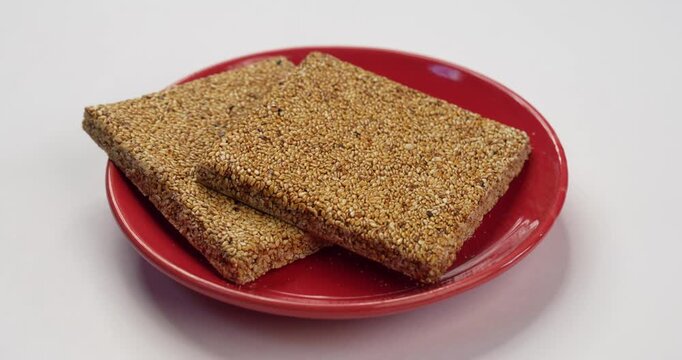 Tilgul Chikki on Plate &ndash; Traditional Sesame and Jaggery Indian Sweet Snack