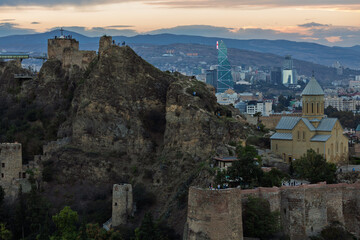 Naklejka premium Scenic View Of Narikala Fortress And St Nicholas Church At Sunset