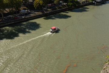 Overhead View Of Boat Moving On Kura River In Tbilisi Georgia © Vadim Volodin