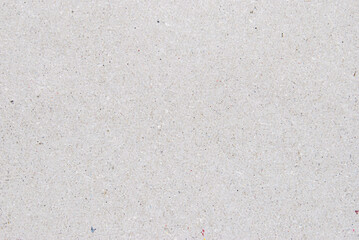 A sheet of gray recycled cardboard texture as background