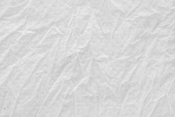 A sheet of a white creased recycled tissue paper texture as background