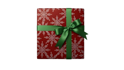 Festive Christmas present box wrapped in red snowflake paper and green ribbon. isolated PNG with Transparent Background
