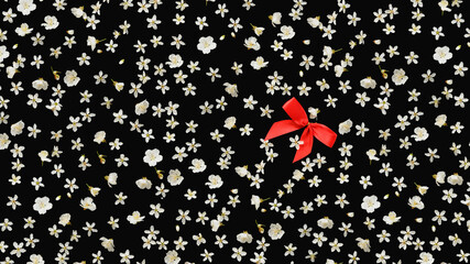 Flat background with white flowers and red bow.