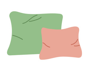 Colorful pillows in simple shapes resting on a clean surface during daylight hours