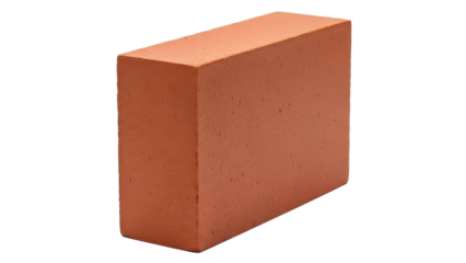 A single terracotta building block rests isolated on a dark background displaying its rough texture and uniform rectangular shape perfect for construction projects.