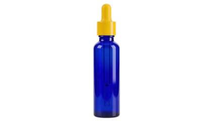Cobalt blue glass bottle with yellow dropper isolated PNG, aromatherapy essential oil container for beauty and health products on transparent background