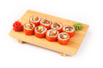 Savoring vibrant sushi rolls on a wooden platter