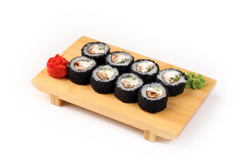 Delicious sushi rolls served on a bamboo platter