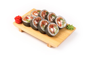 Creative sushi rolls served on a wooden platter with garnishes