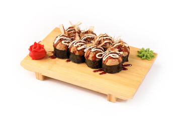 Fresh sushi rolls artfully arranged on a wooden platter