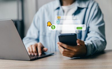 Person holding smartphone with digital notifications.