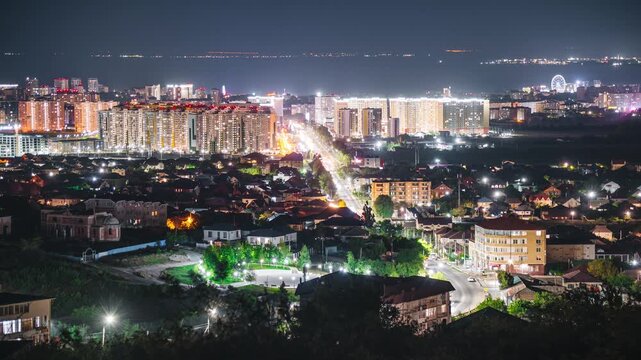 Night city, time-lapse of moving cars on the streets of the night city in Anapa