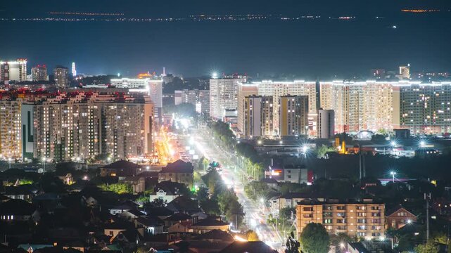 Night city, time-lapse of moving cars on the streets of the night city in Anapa