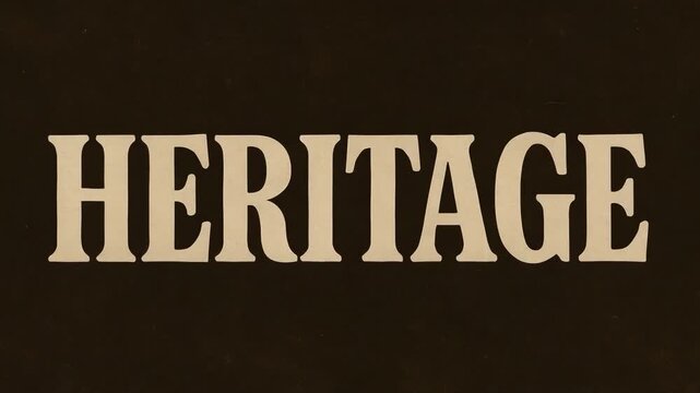 HERITAGE text in large white serif letters on a dark background.