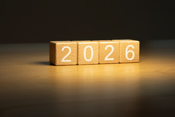 Craft wooden cube blocks 2026. Numbers on wooden blocks with copy space. 2026 happy new year idea concept.