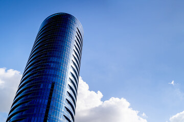 Modern glass skyscraper in the center of the business district against sky, Tel Aviv, Israel.